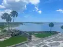 The view from St. Augustine's old stone fort over the bay, with palm trees